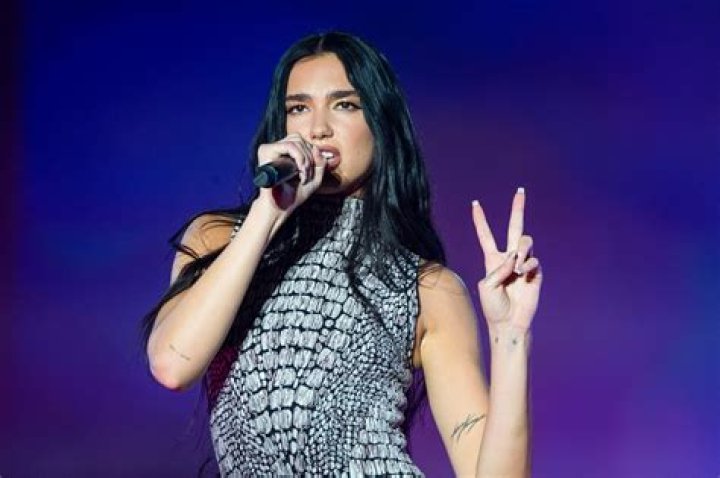 Unveil The Secrets Of Dua Lipa's Iconic Legs: A Comprehensive Guide