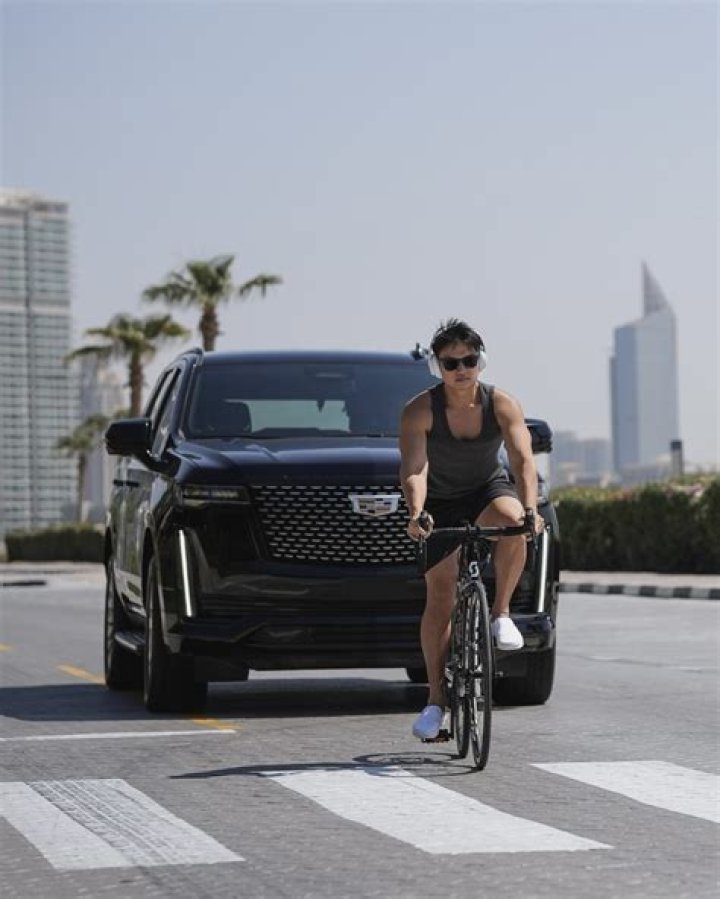 Wayne Liang: Meet the 26-year-old self-made millionaire 4 Wayne Liang riding bicycle